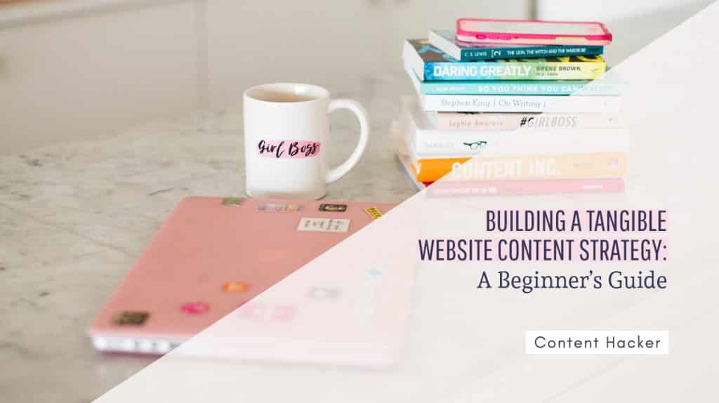website content strategy - laptop books and coffee cup
